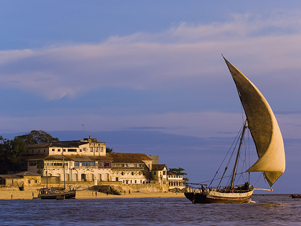 Dhow Under Sail in the Harbor